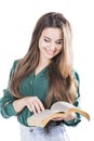 Young woman reading a book on white background Royalty Free Stock Photo