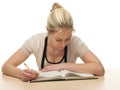 Young Woman Reading Books for School