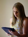 Young Woman Reading Emails. Royalty Free Stock Photo