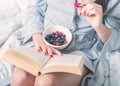 Young woman reading favorite book Royalty Free Stock Photo