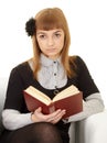 Young woman reads a book