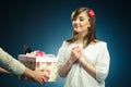 Young woman receives a gift