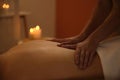 Young woman receiving back massage in spa salon, closeup Royalty Free Stock Photo