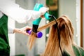 Young woman receiving drying hair Royalty Free Stock Photo