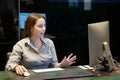 Woman in stress in front of computer. Hotel manager Royalty Free Stock Photo