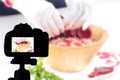 Young woman recording her video blog healthy food preparation, Food Blog concept Royalty Free Stock Photo