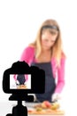 Young woman recording her video blog healthy food preparation, Food Blog concept Royalty Free Stock Photo