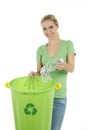 Young woman recycling