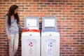 Young woman recycling