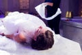 Young woman relaxing in hammam or turkish bath Royalty Free Stock Photo