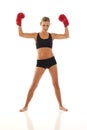 Young woman with red boxing gloves Royalty Free Stock Photo