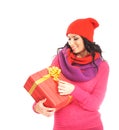 A young woman in red clothes holding a present Royalty Free Stock Photo