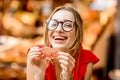 Spanish woman eating jamon at the market Royalty Free Stock Photo