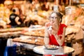 Spanish woman eating jamon at the market Royalty Free Stock Photo