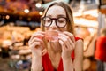 Spanish woman eating jamon at the market Royalty Free Stock Photo