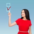 Young woman in red dress pointing her finger Royalty Free Stock Photo