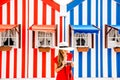 Woman on the striped houses background