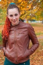 Young woman with red hair portriat. Beautiful girl with braids w