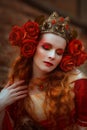 Woman in red medieval dress Royalty Free Stock Photo
