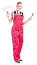 Young woman in red overalls with painting tools Royalty Free Stock Photo