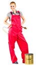 Young woman in red overalls with painting tools Royalty Free Stock Photo