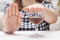 Young woman refused alcohol drink. Concept of alcoholism. Womans alcoholism Royalty Free Stock Photo