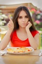 Young Woman Refusing To Eat a Pizza Royalty Free Stock Photo