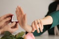 Young woman rejecting marriage proposal because she is already engaged Royalty Free Stock Photo