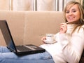 Young woman relax on the sofa Royalty Free Stock Photo