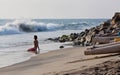 Young woman relaxing on the Arabian sea shore