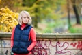 Young woman relaxing in autumn park Royalty Free Stock Photo