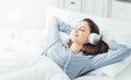 Young woman relaxing in bed Royalty Free Stock Photo