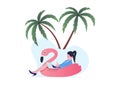 Young woman relaxing on flamingo float, working on laptop. Casual vacation remote work under palm trees