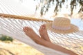 Young woman relaxing in hammock on beach, closeup. Summer vacation Royalty Free Stock Photo