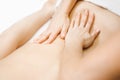 Young woman relaxing with hand professional back massage beauty spa Royalty Free Stock Photo