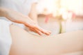 Young woman relaxing with hand professional back massage beauty spa Royalty Free Stock Photo