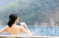 Young woman relaxing in hot springs