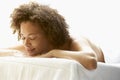 Young Woman Relaxing On Massage Table Royalty Free Stock Photo