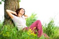 Young Woman Relaxing outdoors Royalty Free Stock Photo