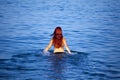 Young woman relaxing in sea