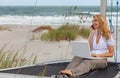 Young Woman Remote Working On Line Using Laptop On Boat At Beach Royalty Free Stock Photo