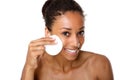 Young woman removing make up with pad Royalty Free Stock Photo