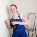 Young woman renovating her home