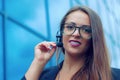 Young woman representative talking in a phone microphone for customer support