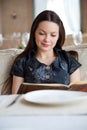 Young woman in restaurant Royalty Free Stock Photo