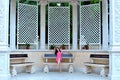 Young woman resting on a bench in a beautiful Park. Royalty Free Stock Photo