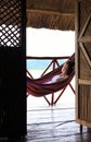 Young woman resting on a hammock in Yandup Island lodge, Panama Royalty Free Stock Photo