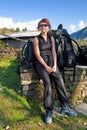 Young woman is resting after hiking, Annapurna trekking, Nepal Royalty Free Stock Photo