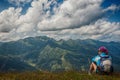 Young woman resting on a mountain hike Royalty Free Stock Photo