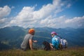 Young woman resting on a mountain hike Royalty Free Stock Photo